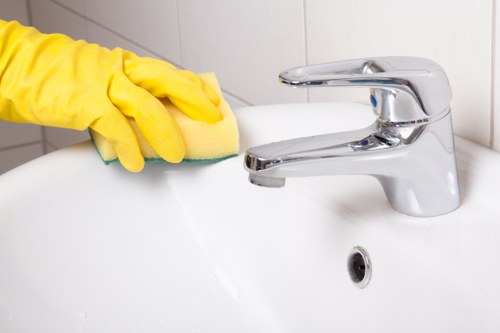 Carpet cleaners managing a safe workspace with tidy equipment layout